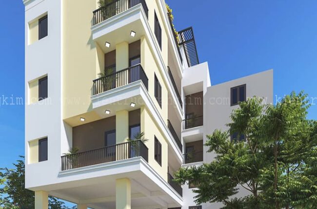 Mặt tiền tòa nhà nhiều tầng màu vàng kem, kiến trúc hiện đại.