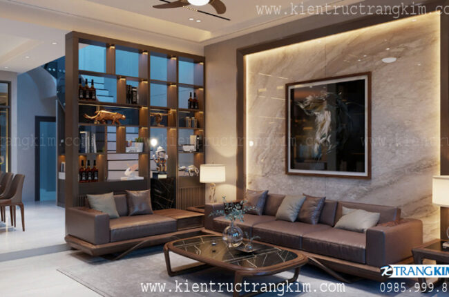 Phòng khách hiện đại với kệ sách và tranh nghệ thuật sang trọng.