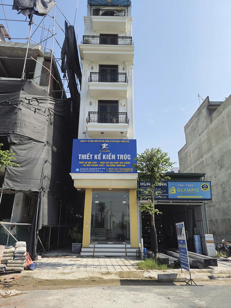 Mặt tiền một công ty thiết kế kiến trúc và cửa hàng tôn thép.