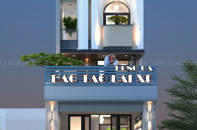 Mặt tiền tòa nhà sáng sủa với biển hiệu đào tạo lái xe nổi bật.